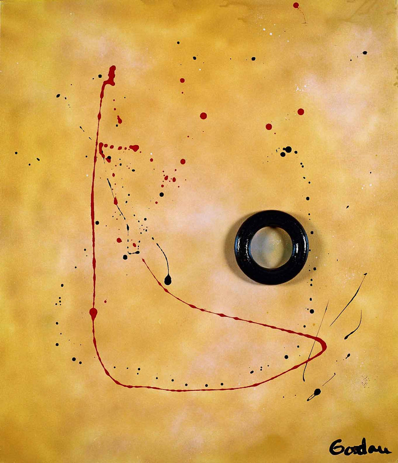 Black ring on yellow with red spatter.