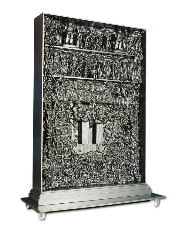 Inside of wooden cabinet with silver grey painted Barbies.